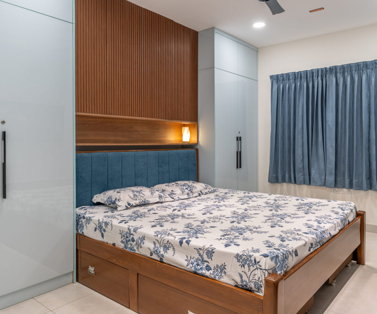 Contemporary bedroom interior with integrated study table and smart storage solutions
